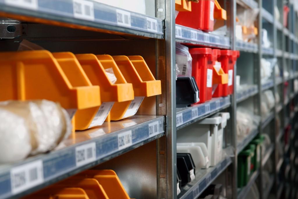 Storage bins and racks in a warehouse