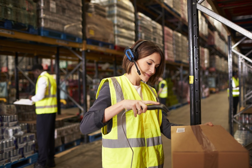 woman scanning in warehouse