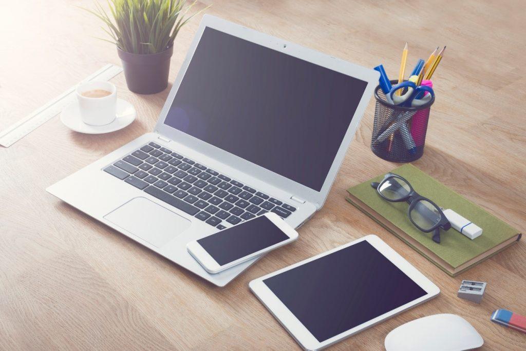 Laptop Mobile and Tablet on a desk