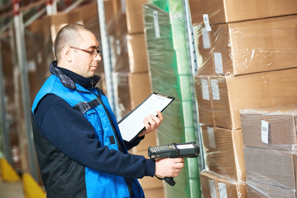 Man Scanning a Barcode