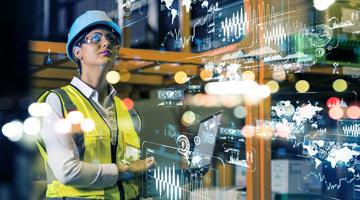 women in warehouse thinking about technology