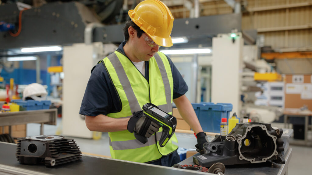 man on production line using rfid reader